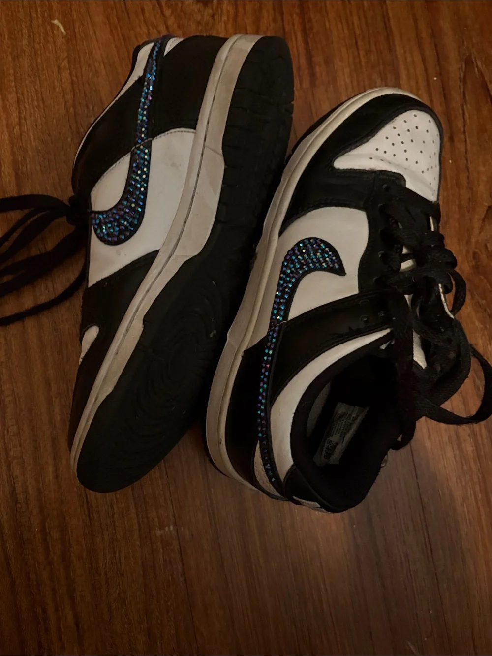 Nike Black and White Low-Top Sneakers with Iridescent Swoosh